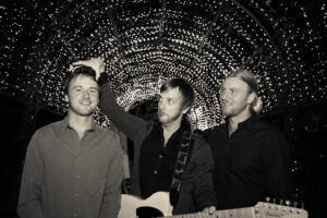 Lily Road wedding band members having fun at Grounds of Alexandria wedding reception