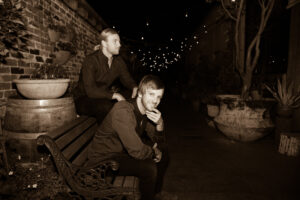Lily Road band members posing for photos at Grounds of Alexandria wedding venue Sydney