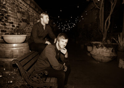 Lily Road band members posing for photos at Grounds of Alexandria wedding venue Sydney